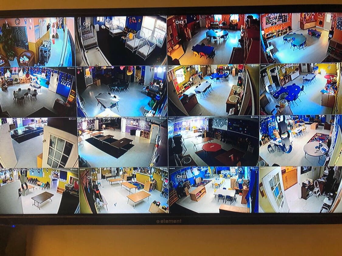 Security camera system showing sixteen camera views on one monitor